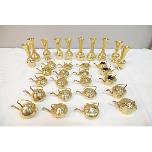 545 - A large assortment of vintage brassware.