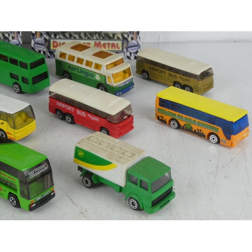 19 - A lot of model cars etc including Tomica, Matchbox and two unopened packs of mini buses.