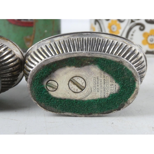 75 - A vintage ceramic Tobacco jar, a vintage Essco oil can, along with two vintage table lighters.