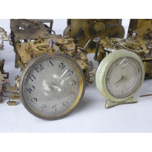 93 - A very large lot of assorted clock parts.