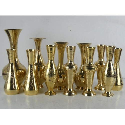 119 - A collection of 12 vintage brass vases.