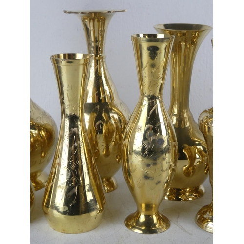 119 - A collection of 12 vintage brass vases.