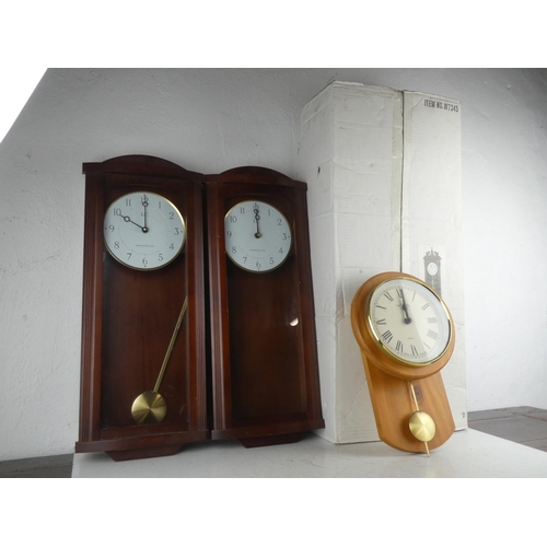 126 - 4 wall clocks.