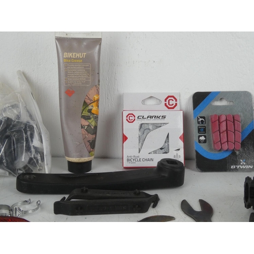 132 - An assortment of bicycle parts & accessories.