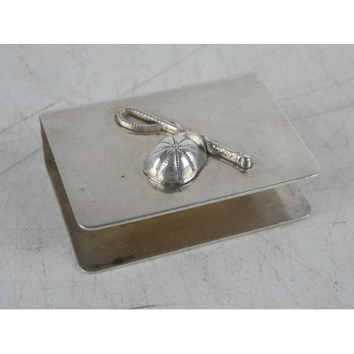 160 - A vintage Silver matchbook cover with horse racing/ jockey theme.