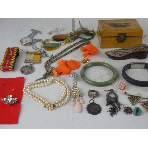 169 - A large assortment of various collectables, to include glass vase, jewellery & more.