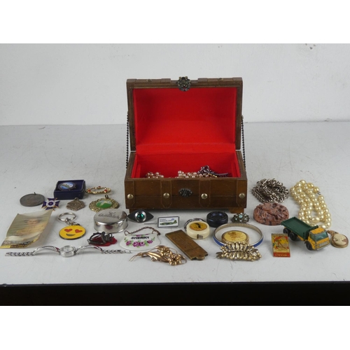 172 - A wooden box containing assortment of collectables etc.