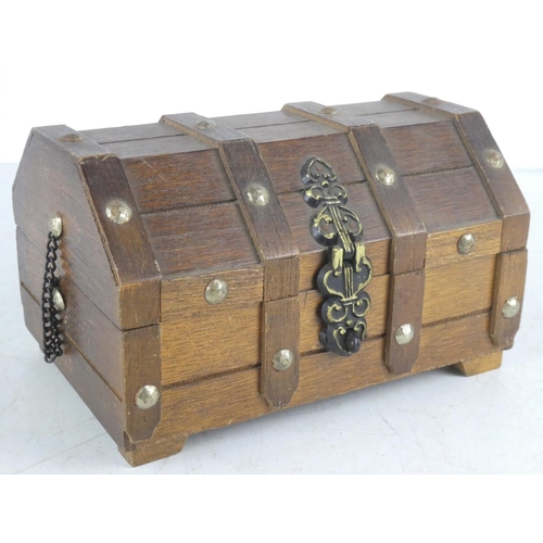 172 - A wooden box containing assortment of collectables etc.