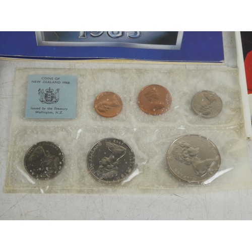 180 - A collection of 9 vintage coin sets.