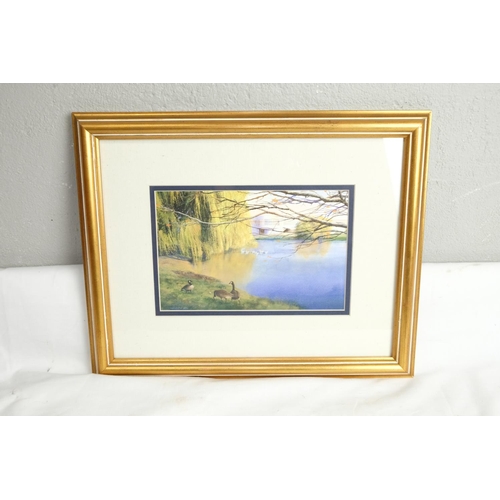 425 - A framed print by Michell Tolle.