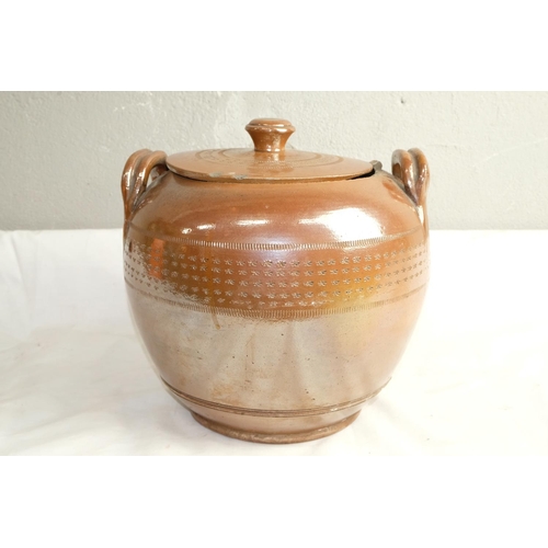 428 - A large antique two handled lidded urn.