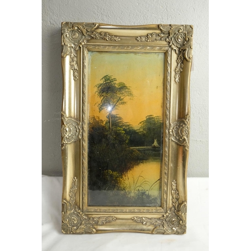 435 - A gilt framed oil painting, measuring 30cm x 50cm including frame.