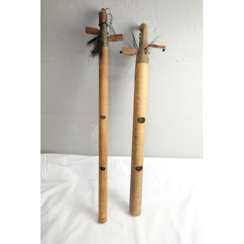 446 - Two antique musical instruments made from bamboo.