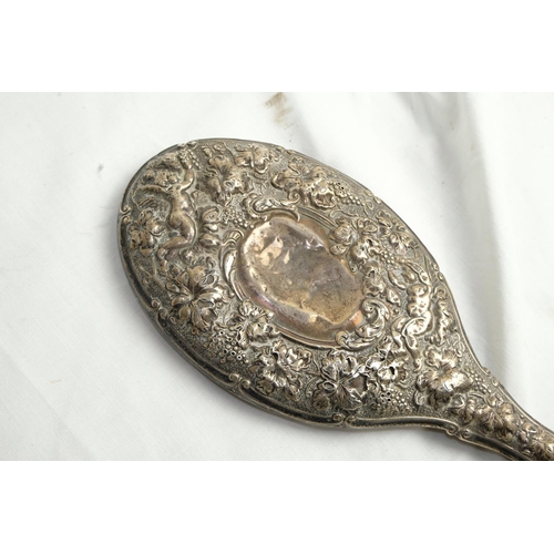 476 - A Sterling Silver backed shaving brush and antique dressing table mirror.