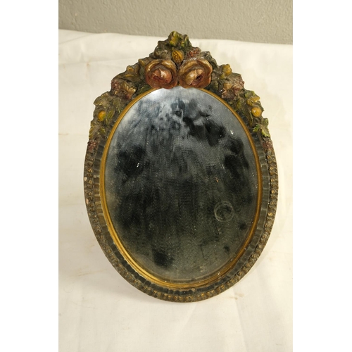 481 - A small vintage dressing table mirror with floral detail, measuring 10