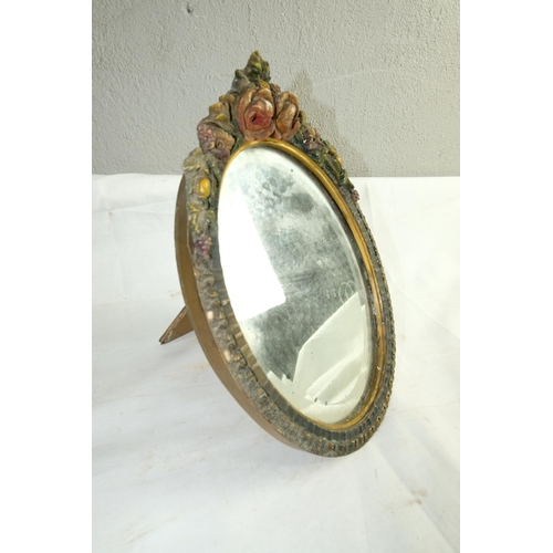 481 - A small vintage dressing table mirror with floral detail, measuring 10