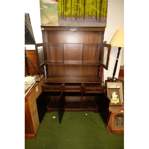 497 - A vintage Old Charm style dresser with leaded glass doors.