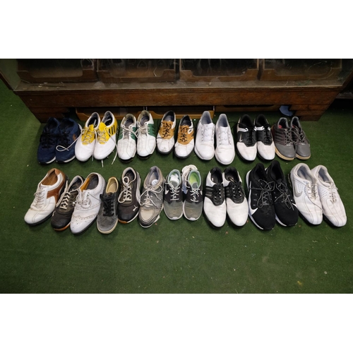 498 - A large lot of men's golfing shoes.