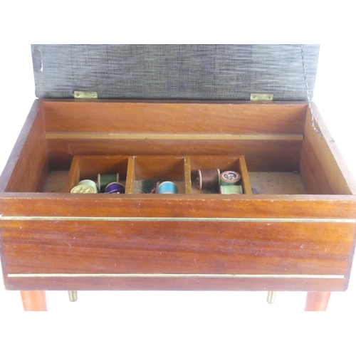 332 - A sewing box/table with contents.