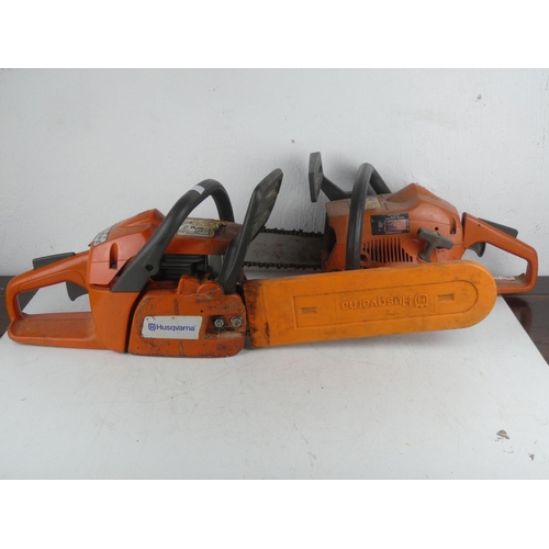 353 - Two Husqvarna chain saws.