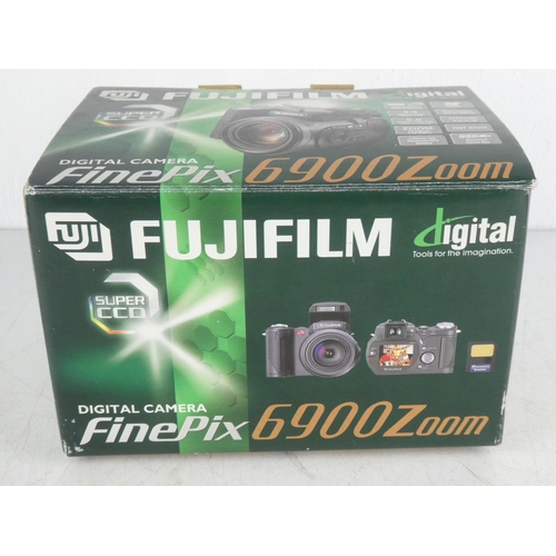 359 - A boxed Fujifilm digital camera, 6900 zoom.