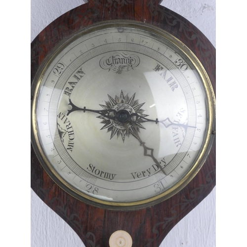 371 - A stunning antique barometer, measuring 38