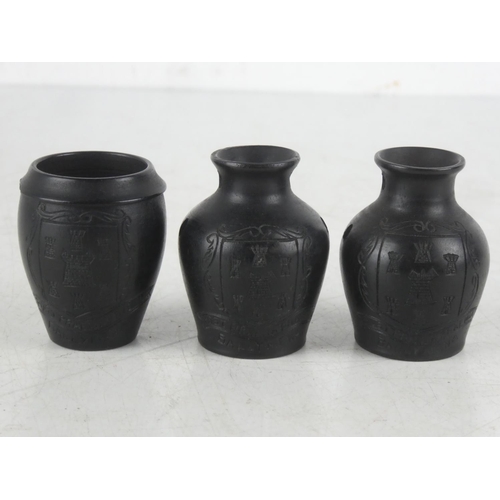 385 - Three miniature 'Ballymena' crested bog oak pots (a/f).