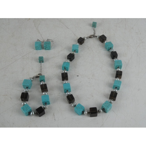 387 - A turquoise and beaded necklace, bracelet and earring set.