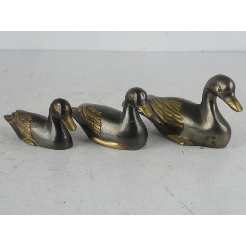 199 - A set of 3 vintage brass ducks.