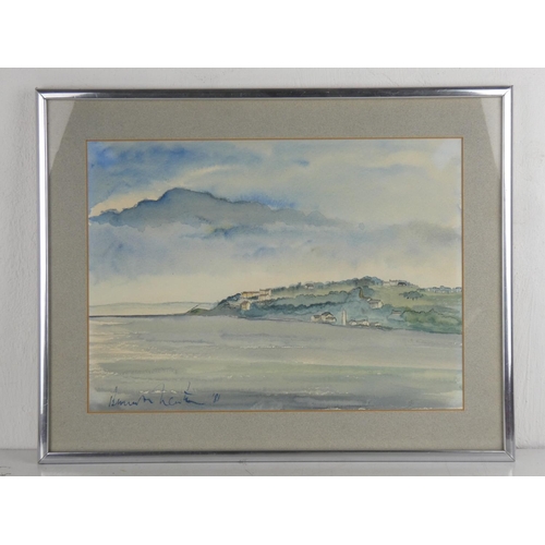 293 - A framed watercolour of a costal scene, signed, measuring 47cm x 37cm.