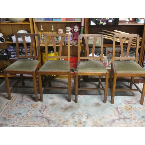 292 - A set of four vintage oak framed dining room chairs.