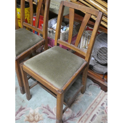 292 - A set of four vintage oak framed dining room chairs.