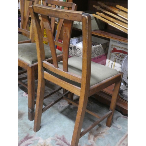 292 - A set of four vintage oak framed dining room chairs.