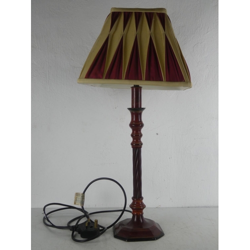 278 - A metal based table lamp and shade.