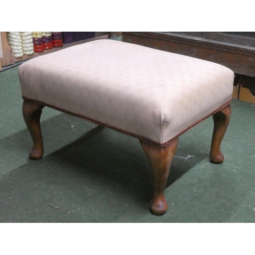 273 - An upholstered footstool.