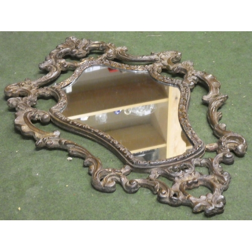 271 - A stunning antique wall mirror with decorative wooden frame, measuring 29