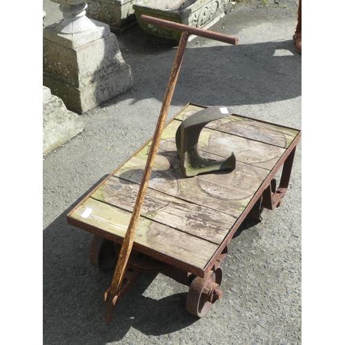 174 - An antique H H Stark Limited, London hand truck and an antique cobblers shoe last.