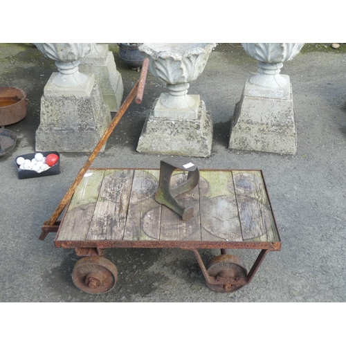 174 - An antique H H Stark Limited, London hand truck and an antique cobblers shoe last.