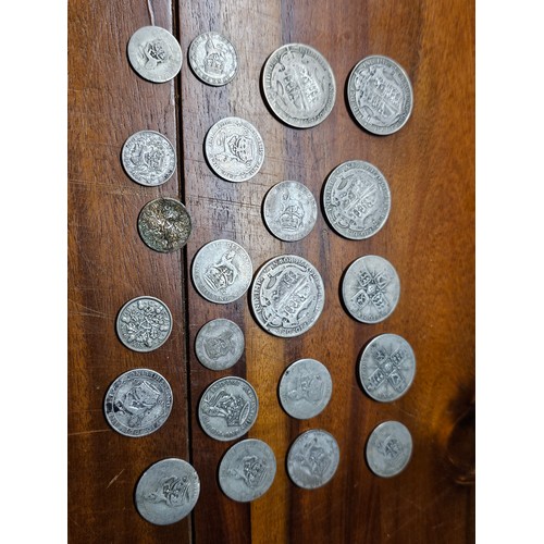 211 - An assortment of pre 1947 coinage, weighing 146g.