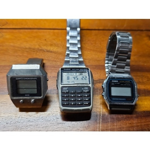 215 - A collection of 3 vintage digital watches, to include a Casio Data Bank, Casio Alarm Chrono & anothe... 