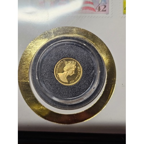 235 - A limited edition 'Gold Cat- coin First Day Cover, with 999.9 gold coin.