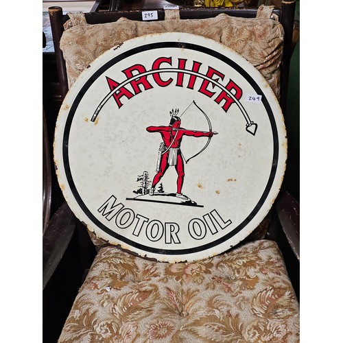 249 - A vintage Archer Motor Oil sign. Measuring 59cm in diameter.