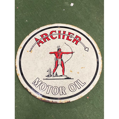 249 - A vintage Archer Motor Oil sign. Measuring 59cm in diameter.