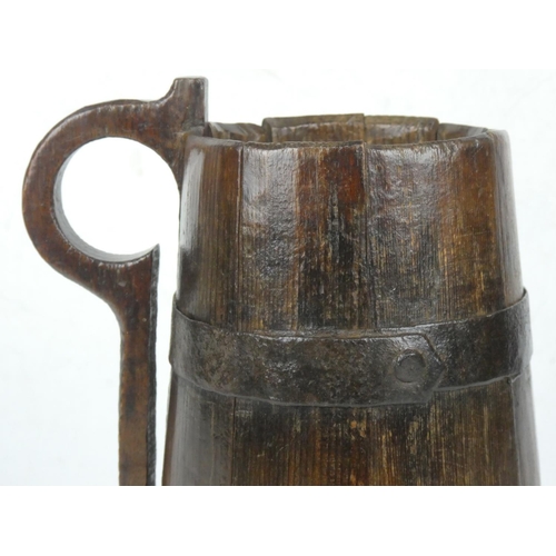 29 - An early 19th century wooden tankard.