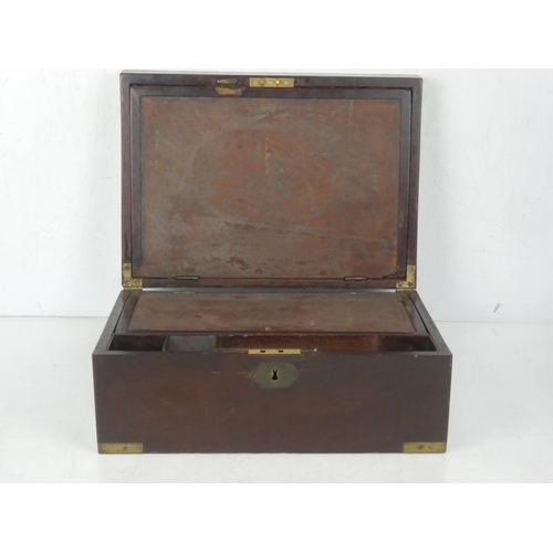 38 - An antique writing box with brass detail.