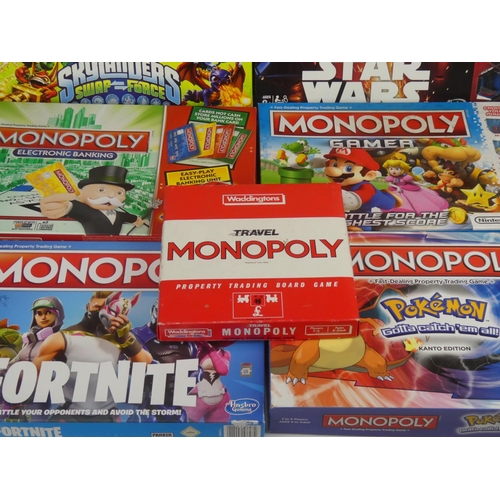 47 - A lot of Monopoly board games.