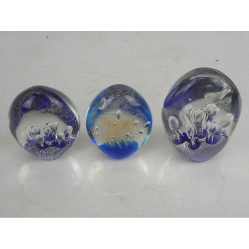 50 - A stunning pair of glass paperweights.