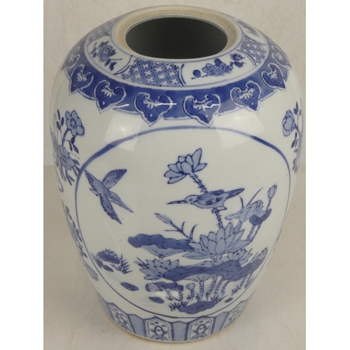 62 - A large blue and white patterned vase, measuring 12