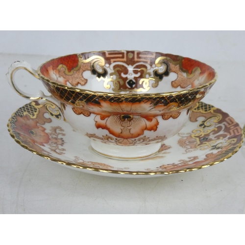 66 - An antique cabinet cup and saucer.