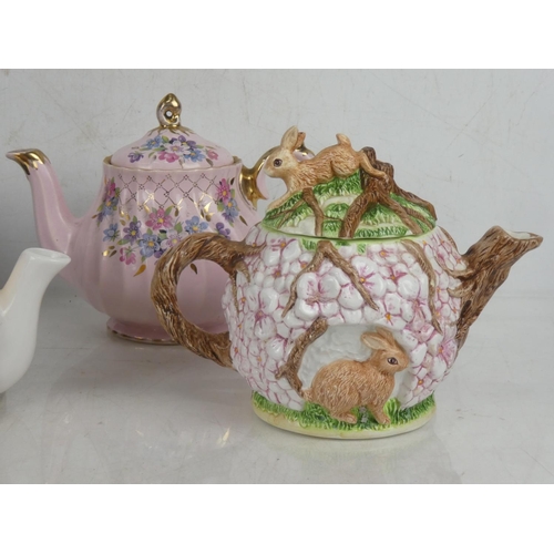 70 - A vintage Sadler floral patterned teapot with gilt detail and three others.